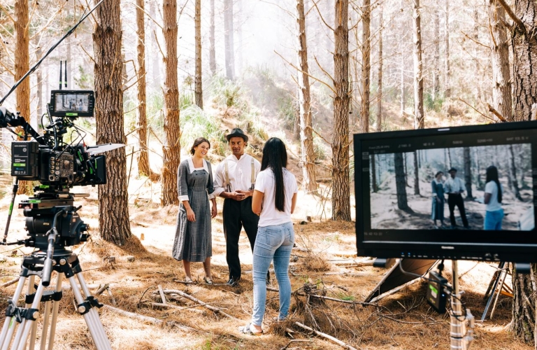 Director talks with actress and actor about scene