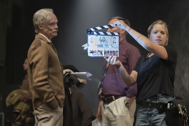 Clapperboard on set of Black Hands